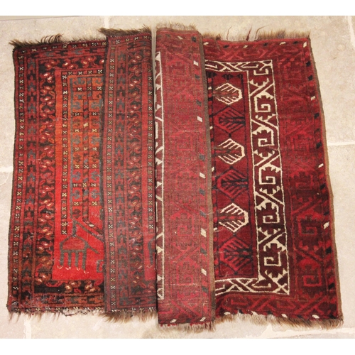 628 - A hand knotted Caucasian woollen prayer rug, in red black and ivory colourways, the stylised leaf pa... 