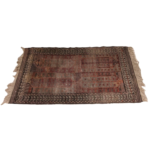 634 - A hand knotted woollen tribal rug, in red, green and brown colourways, the quarter panels with lozen... 