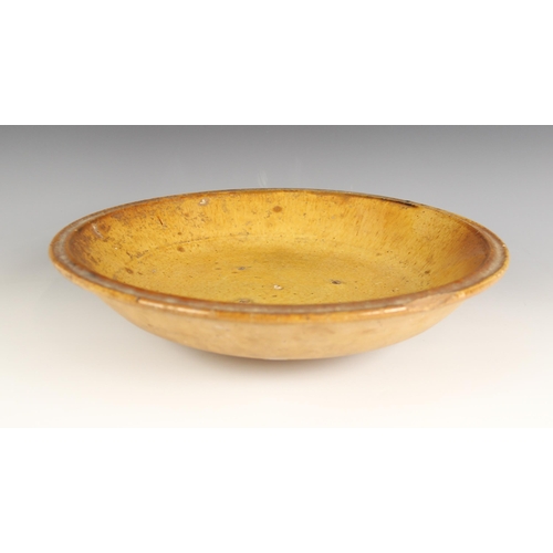 488 - A salt glazed earthenware bowl, probably British late 18th century, of wide shallow form with channe... 