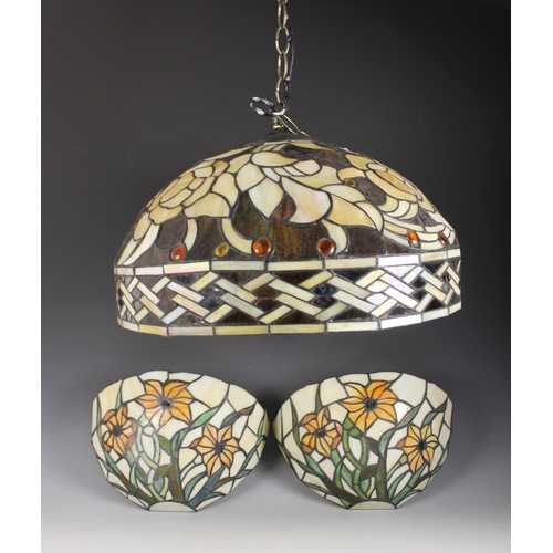 534 - A Tiffany style pendant light fitting, late 20th century, of floral design in green and brown shades... 