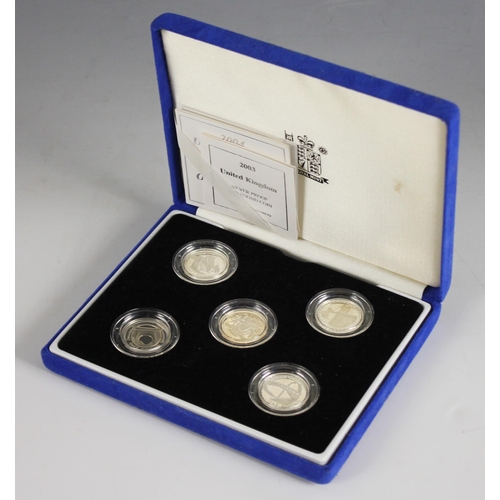 60 - A Royal Mint cased set of five silver proof £1 coins, including examples from 2003 - 2007, each in c... 