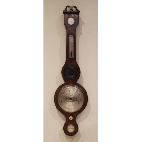 682 - A mid 19th century mahogany wheel barometer by 'Britton Stamford' the swans neck pediment above a si... 