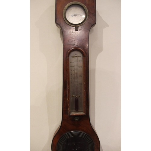 682 - A mid 19th century mahogany wheel barometer by 'Britton Stamford' the swans neck pediment above a si... 