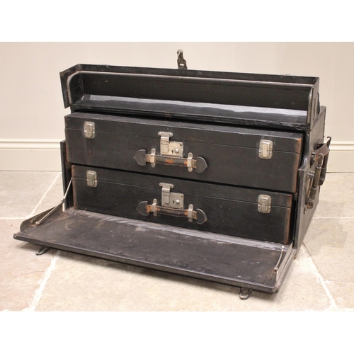 568 - A Vintage motoring trunk by Finnigans of New Bond Street, the Rexene covered and leather trimmed tru... 