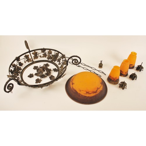 535 - An Art Nouveau wrought iron and orange marbled glass ceiling light fitting, by Muller Freres, Lunevi... 