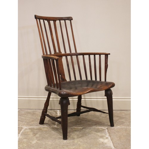 760 - A late 18th/early 19th century primitive ash and elm comb back Windsor chair, probably Thames Valley... 