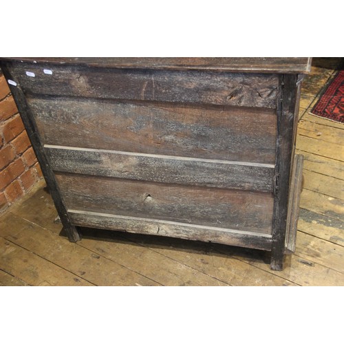 724 - A Jacobean oak chest of drawers, late 17th century, the twin plank top above an arrangement of three... 