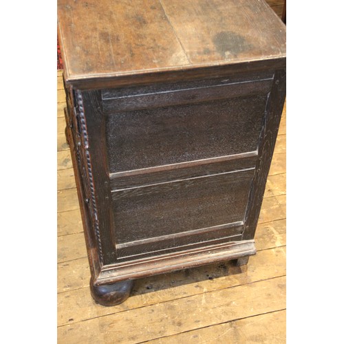 724 - A Jacobean oak chest of drawers, late 17th century, the twin plank top above an arrangement of three... 