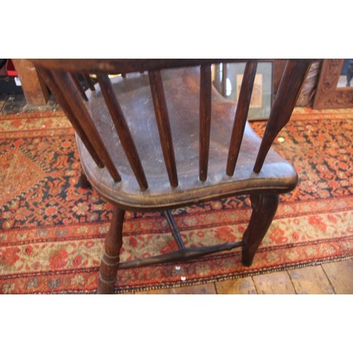 760 - A late 18th/early 19th century primitive ash and elm comb back Windsor chair, probably Thames Valley... 