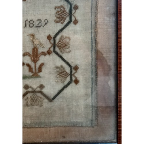 609 - A George IV sampler dated 1829, worked by Mary Worth aged 10 years, worked in silk threads on a fine... 