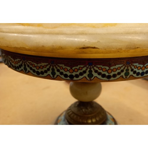 650 - A 19th century continental onyx and enamel brass mounted tazza, of circular form with ogee rim, rais... 