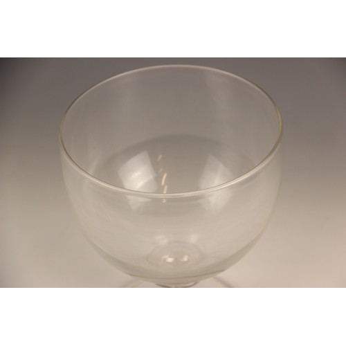 523 - A plain glass rummer of large proportions, late 19th or early 20th century, the funnel bowl on waist... 