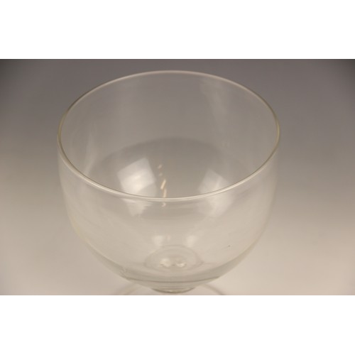 523 - A plain glass rummer of large proportions, late 19th or early 20th century, the funnel bowl on waist... 