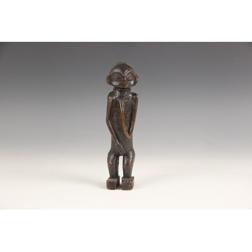 454 - A selection of African works of art, 20th century, to include a Pende mask, 32cm long, a small Hemba... 