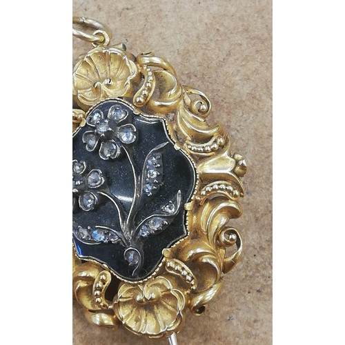 124 - A William IV mourning pendant brooch, the central black enamelled lozenge shaped panel with applied ... 