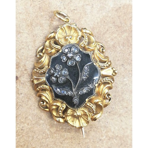 124 - A William IV mourning pendant brooch, the central black enamelled lozenge shaped panel with applied ... 