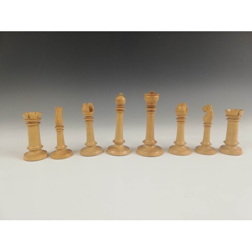 590 - A boxwood and ebonised Northern Upright pattern chess set, comprising thirty-two unweighted pieces, ... 