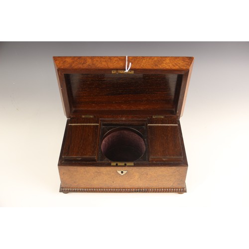 665 - A burr walnut and rosewood sarcophagus shaped tea caddy, early 19th century, the hinged cover inlaid... 