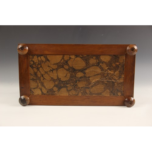 665 - A burr walnut and rosewood sarcophagus shaped tea caddy, early 19th century, the hinged cover inlaid... 