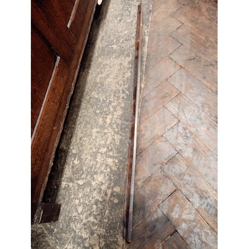 734 - An 18th century oak dresser, the open plate rack with a moulded cornice over three shelves, upon the... 