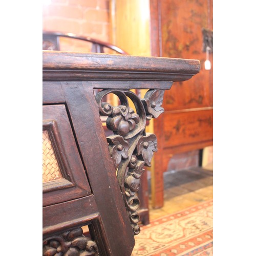 841 - A Chinese influence rattan and hardwood console table, 20th century, the framed rectangular top with... 