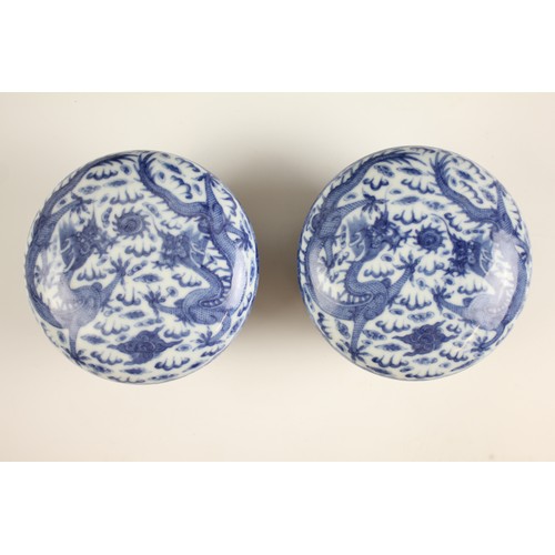 418 - A pair of Chinese porcelain blue and white boxes and covers, Qianlong seal mark, each circular box p... 