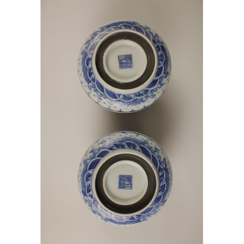 418 - A pair of Chinese porcelain blue and white boxes and covers, Qianlong seal mark, each circular box p... 