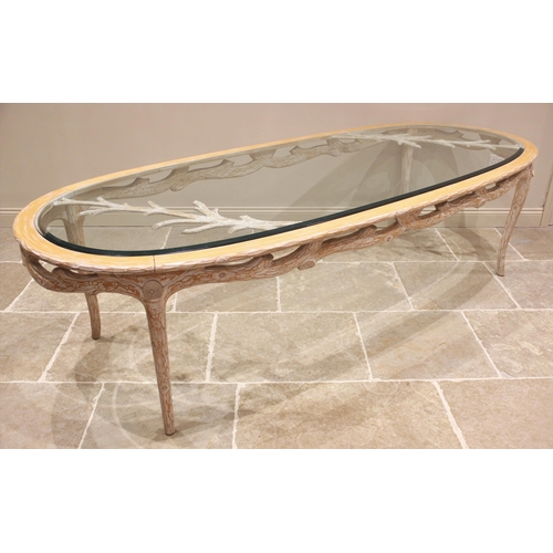 706 - A contemporary painted beech wood and glass top dining table, late 20th century, the substantial ova... 