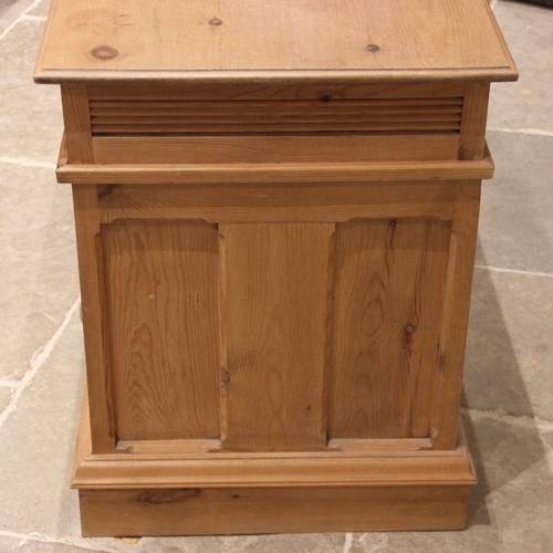 663 - A Victorian style pine twin pedestal desk, late 20th century, the rectangular moulded top over three... 