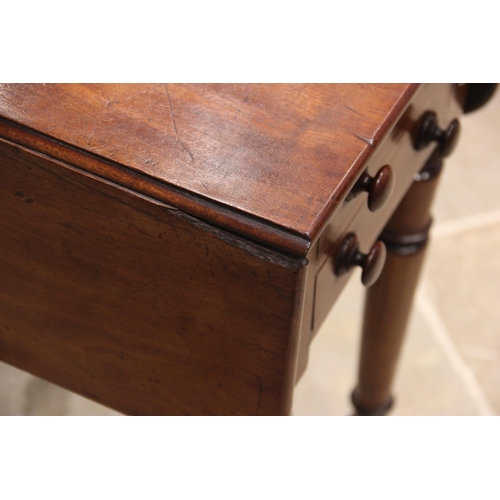 671 - A mid 19th century mahogany work table, the rectangular drop leaf top with rounded corners, above tw... 