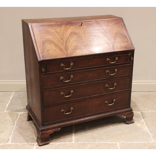 674 - A George III mahogany bureau, the quarter veneered fall front opening to a compartmentalised interio... 