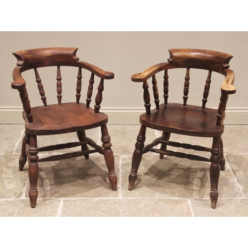 679 - A Victorian style stained beech wood captains chair, 20th century, the horseshoe shaped top rail upo... 