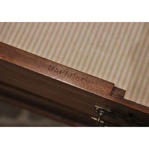 687 - A late Victorian walnut library/writing table by Maple & Co, the rectangular thumb moulded top above... 