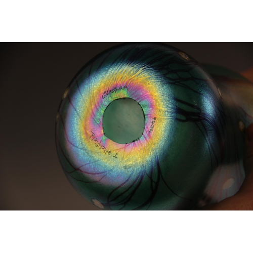 511 - A John Ditchfield for Glasform studio glass vase of waisted form, the iridescent green glass punctua... 