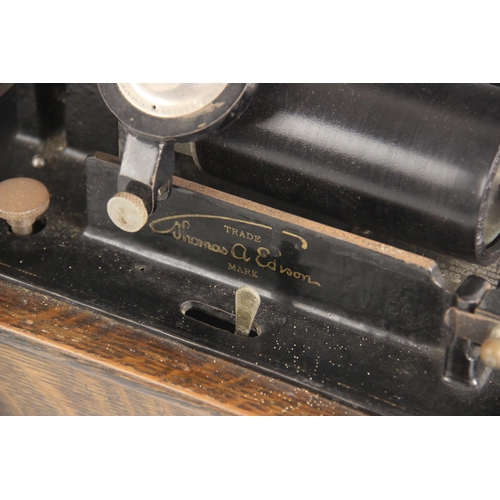 561 - An oak cased Thomas A. Edison cylinder phonograph, early 20th century, the riveted patent plaque car... 