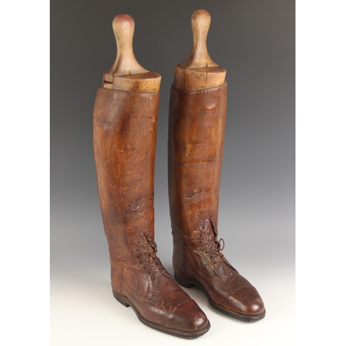 570 - A pair of gentleman's part-laced leather riding boots, 28.5cm heel to toe, 48.5cm high, with origina... 