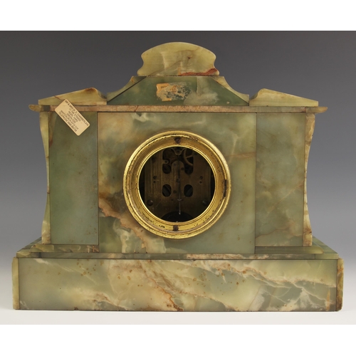 608 - A Victorian green onyx mantel clock, the case of architectural form with a pair of freestanding pill... 