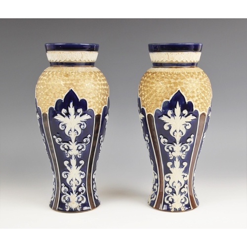 467 - A pair of Royal Doulton vases, early 20th century, of inverted baluster form, the body with relief m... 