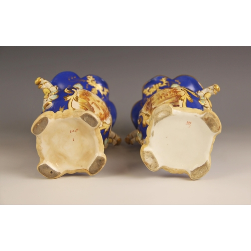 478 - A pair of English porcelain twin handled vases, probably Coalport early 19th century, each of ovoid ... 