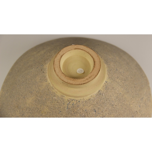 504 - A large studio pottery bowl by Pam Wright, late 20th century, of conical form with shaped rim and st... 