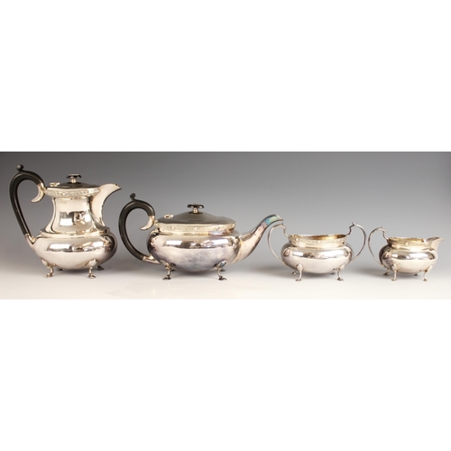 66 - An early 20th century silver plated tea service by Davis & Sons of Glasgow, comprising teapot, hot w... 