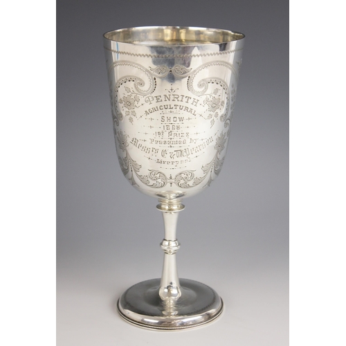 67 - A Victorian silver trophy cup, Josiah Williams & Co, London 1892, of tapered cylindrical form on kno... 