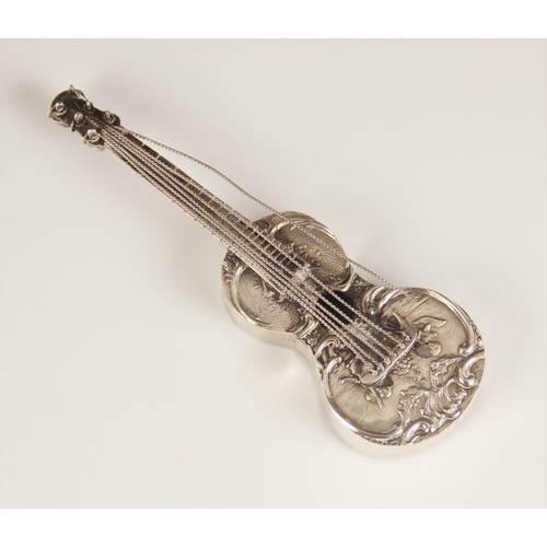 102 - A Dutch silver miniature model of a guitar, of typical form, embossed with cherubs playing instrumen... 