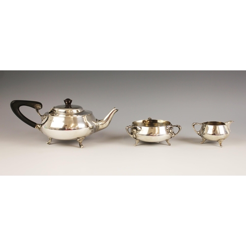 106 - An Arts & Crafts three-piece silver tea service, Charles Edwards, Birmingham 1879, comprising teapot... 