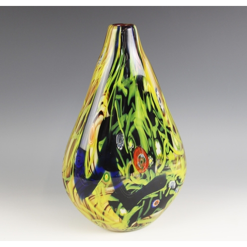 497 - A Murano style art glass vase, 20th century, of flattened baluster form with layered swirled and rib... 