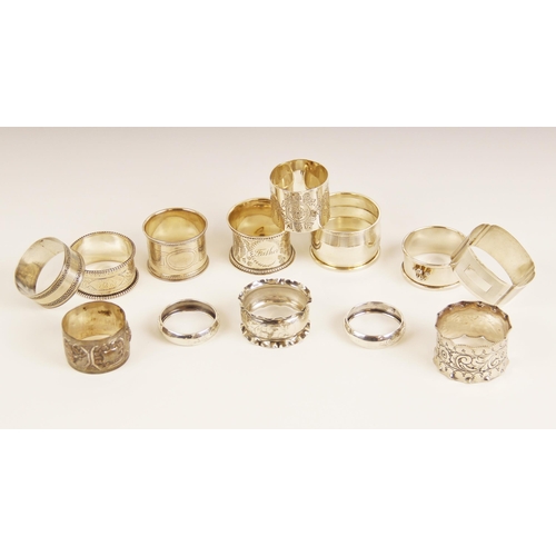 76 - A selection of Victorian and later silver and silver coloured napkin rings, to include an Elizabeth ... 