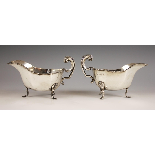 86 - A pair of George V silver gravy boats, Thomas Latham & Ernest Morton, Birmingham 1912, each of typic... 