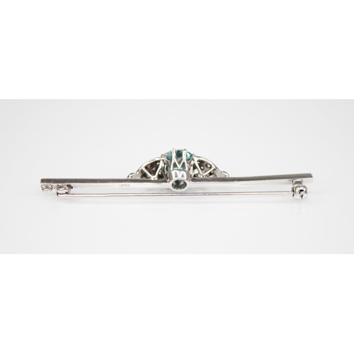 178 - An Art Deco zircon and diamond platinum bar brooch, the central round mixed cut zircon measuring 8.8... 