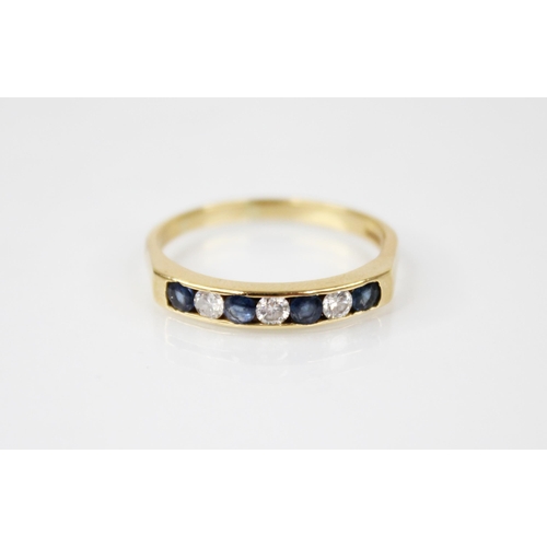 187 - A sapphire and diamond seven-stone ring, comprising four round mixed cut sapphires interspersed by t... 