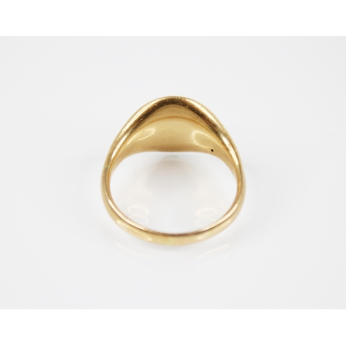 202 - A gold coloured signet ring, the circular matrix with monogrammed initials, 14mm x 11mm, continuing ... 